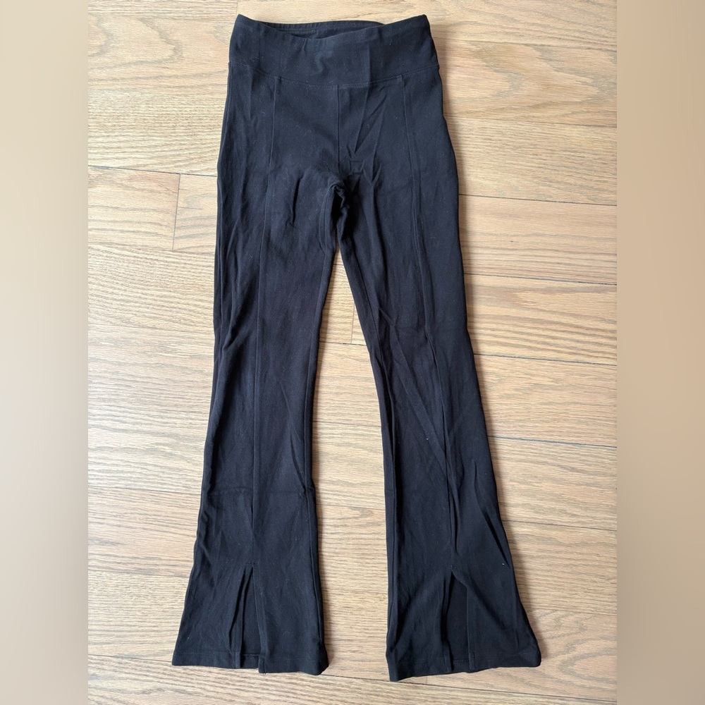 The Children’s Place black flare leggings with slit in front. Size M (7/8)